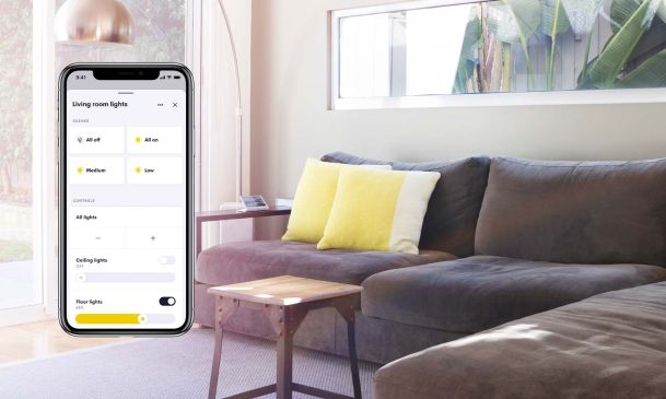 Crestron phone interface over a living room image