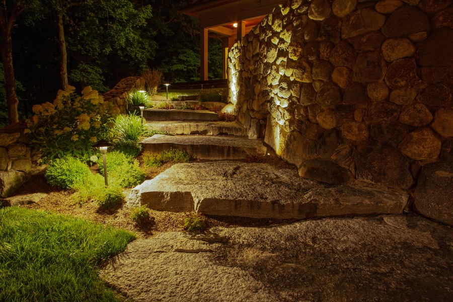 Coastal Source path lights illuminating a series of outdoor steps.