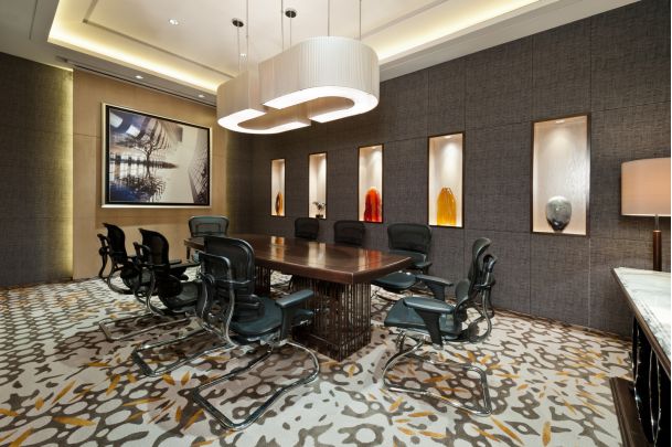 conference room with LED lighting and wooden table